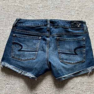 Dark wash shortie AE shorts